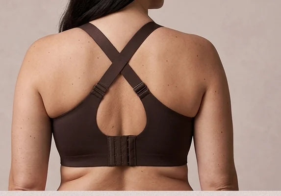 Back detail of the SoftLift™ Bra: cross-over straps, keyhole and hook-and-eye fastening.